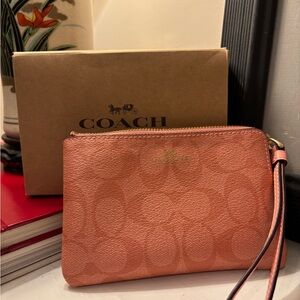 Coach Light Pink Wristlet with Signature Pattern